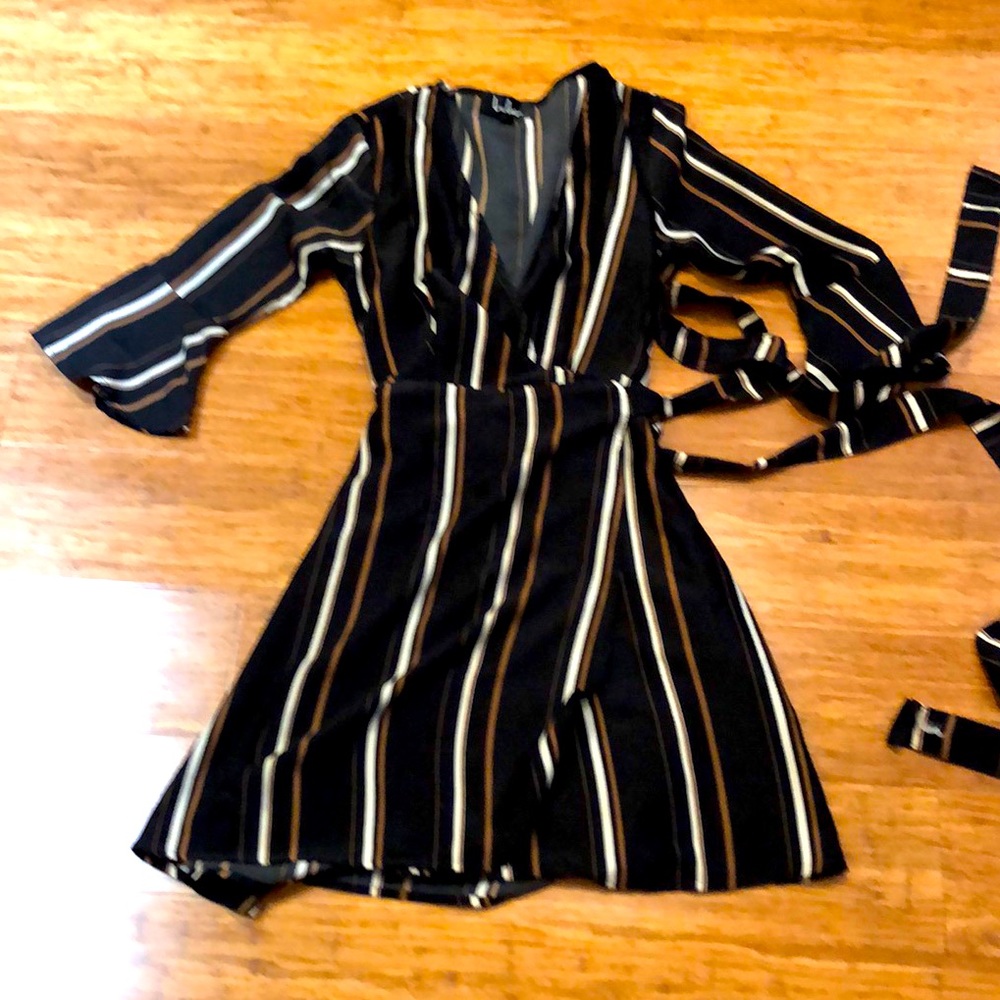 Lulu's Gone to Geneva black striped wrap dress. XS